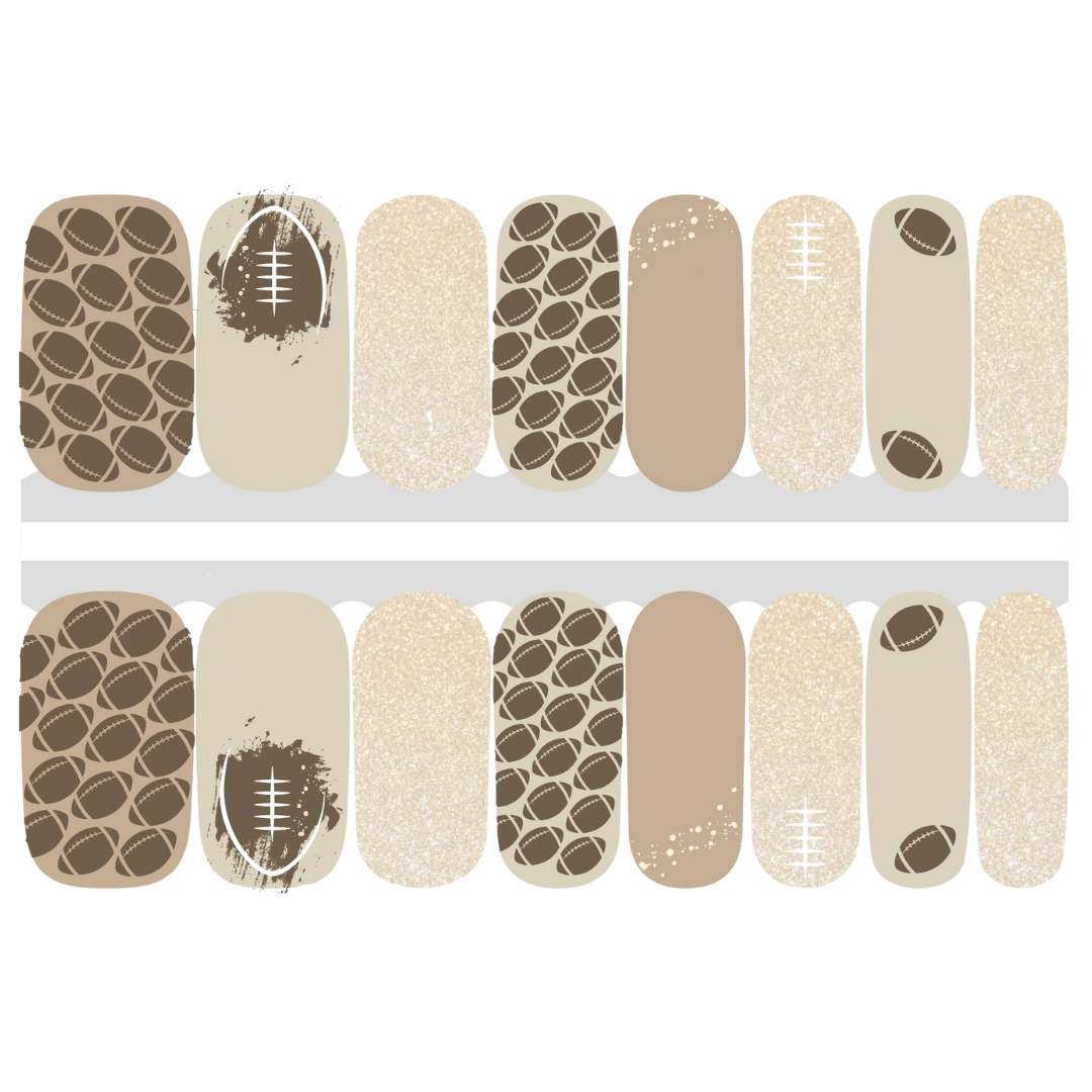 gold nail stickers adorned with football make for a neutral and classy mani for your game day attire