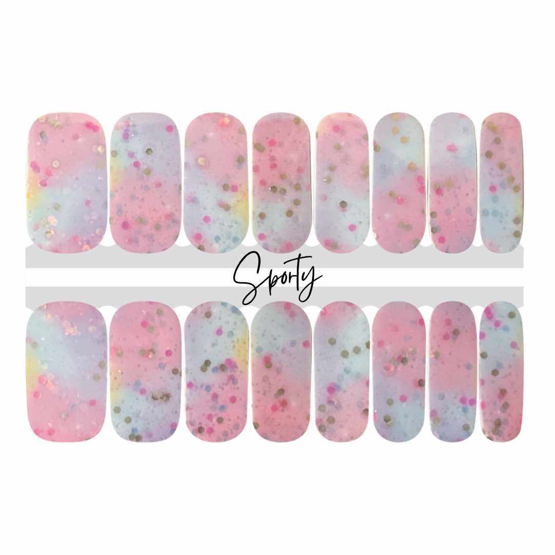 light pink and blue with flecks of glitter throughout make this nail wrap have an out of this world, magical appearance perfect for a mom and me manicure
