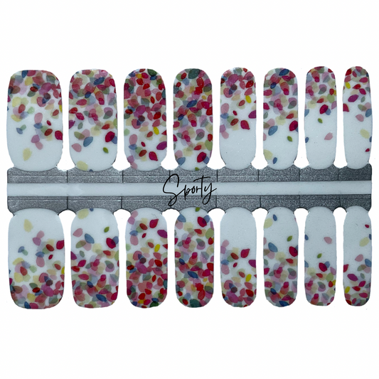 Abstract flower petals in rainbow colors on a white background make these the most fun nail wraps!
