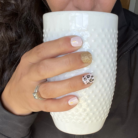 Cheetah nails, gold glitter nails, and pink nails are perfect for that coffee date and your everyday nail design, yet they are classy and sassy enough to carry you through a night out with the girls too!