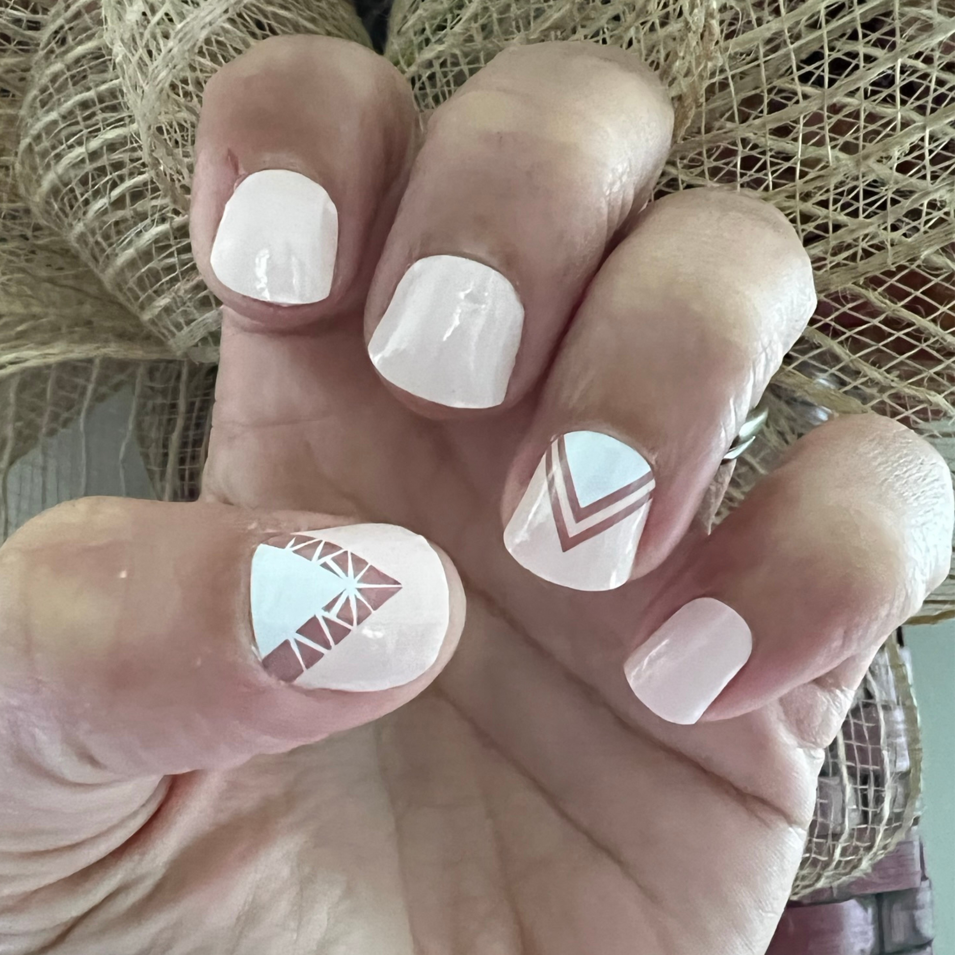 ballet pink nail wraps with white and translucent angular sections make this a modern twist on the classic french manicure.  nail wraps are a fast and easy home manicure