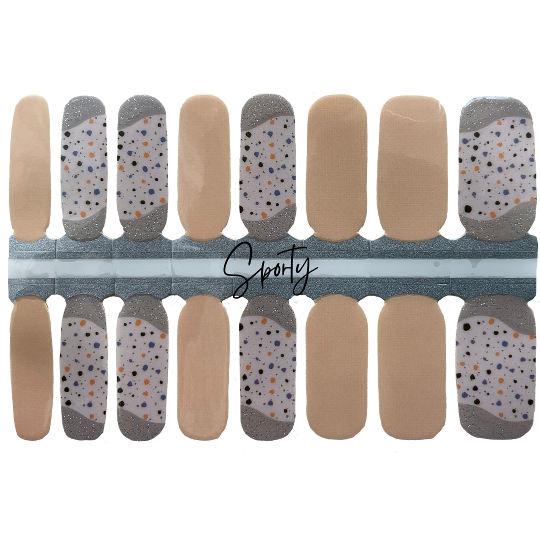 neutral palette with silver glitter, and terrazzo inspired design.  an elevated neutral nail design. 