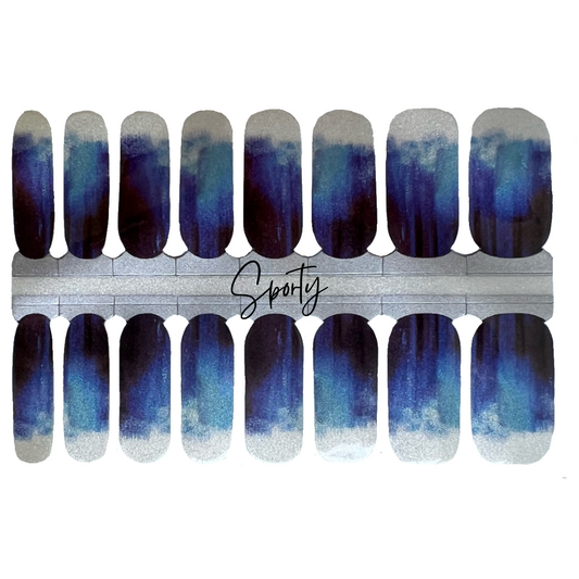 Shimmering blues cascade along this nail strip and end with a white glimmering cuticle edge just like the end of a majestic waterfall.  Switch up the direction of a nail strip to create a mixed mani with even more interest!